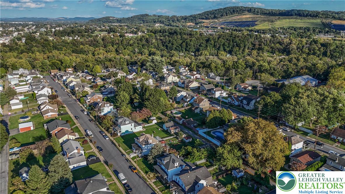 2246 2nd Street Wilson, PA 18042 - Photo 46 of 47 an aerial view of residential houses with outdoor space and trees