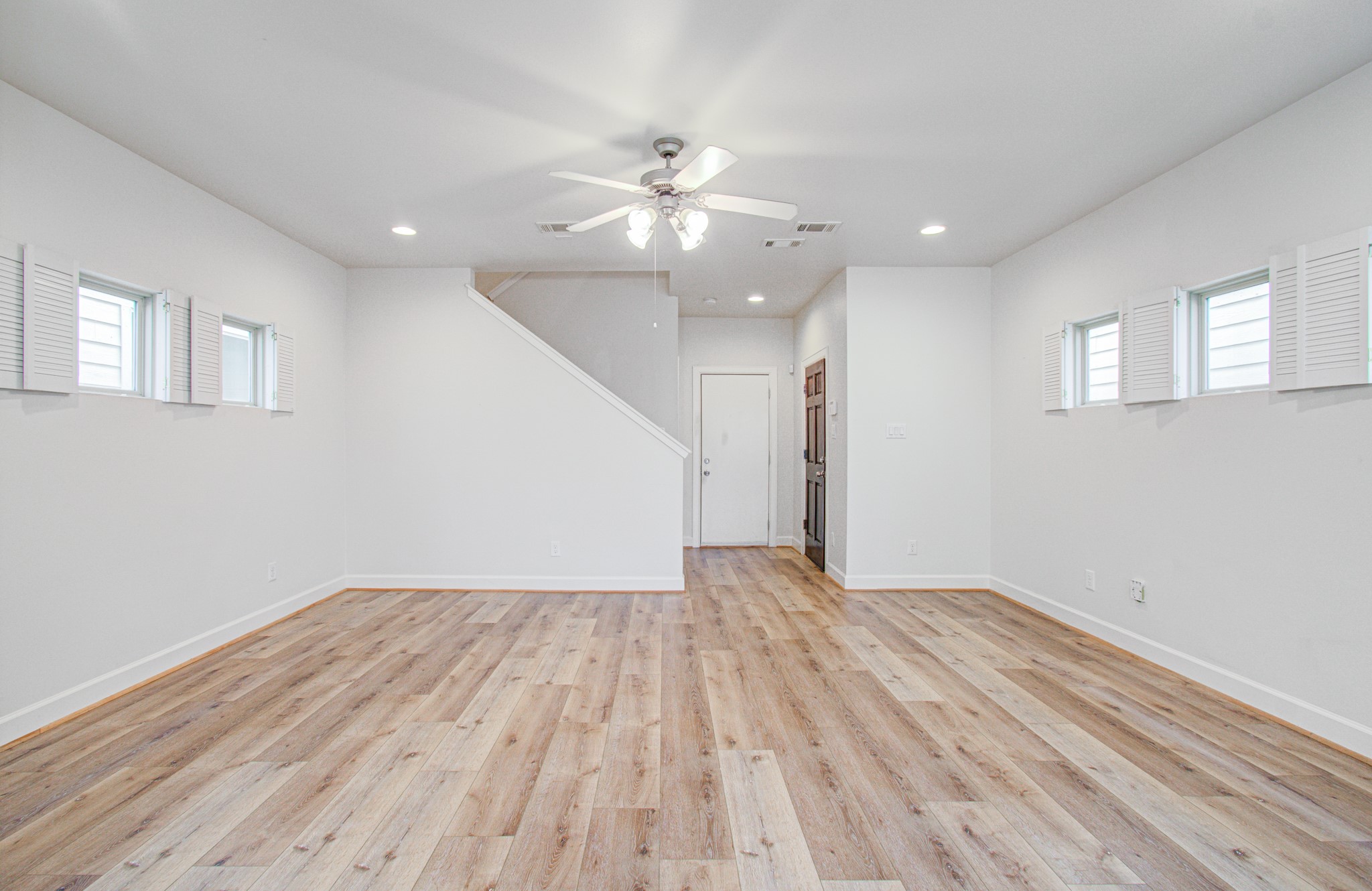624 East 39th Street Houston, TX 77022 - Photo 13 of 37 a view of empty room with wooden floor and fan