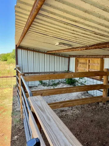 a view of a house with a snow in the yard