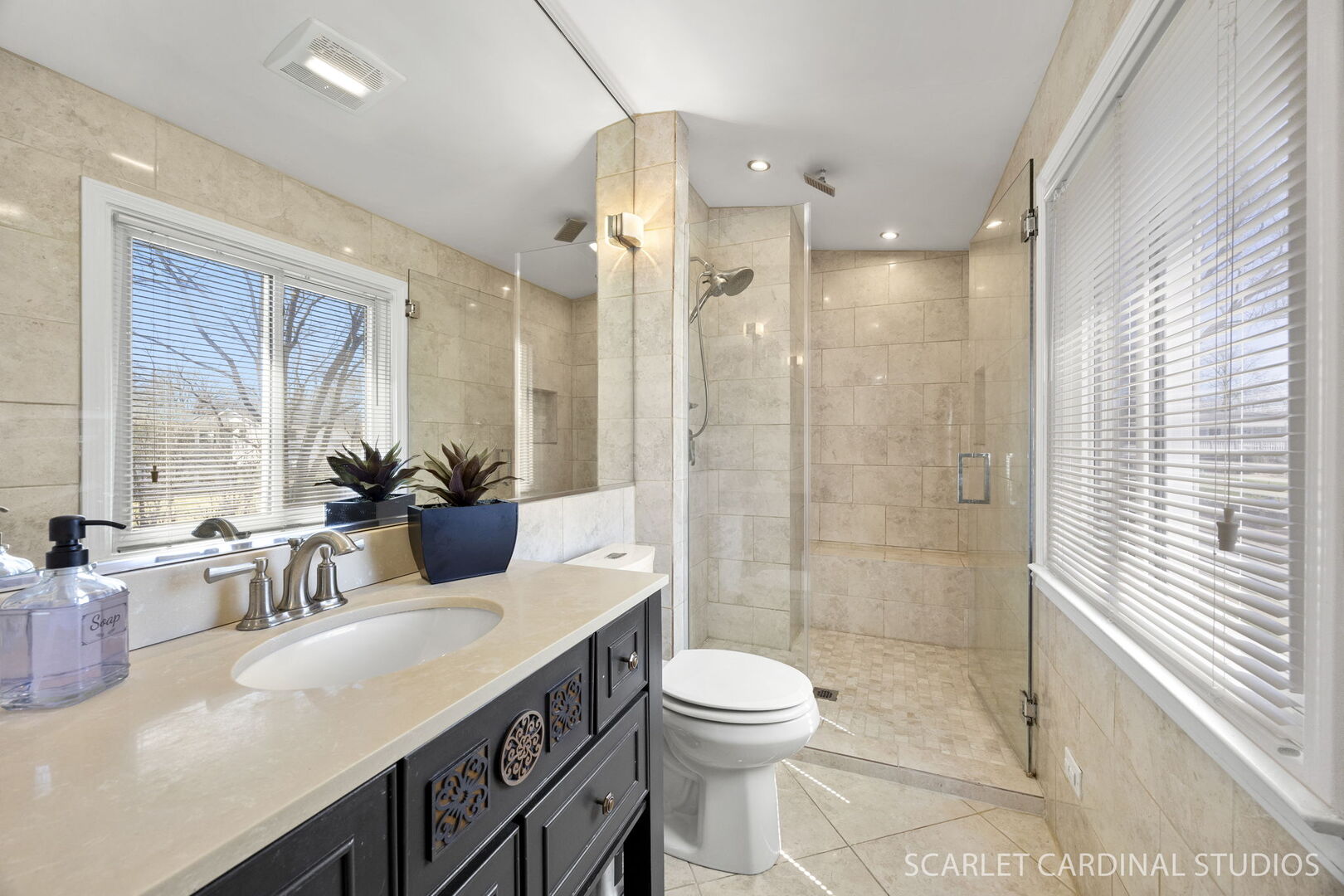 1003 East Alder Lane Mount Prospect, IL 60056 - Photo 18 of 35 a bathroom with a double vanity sink toilet and shower