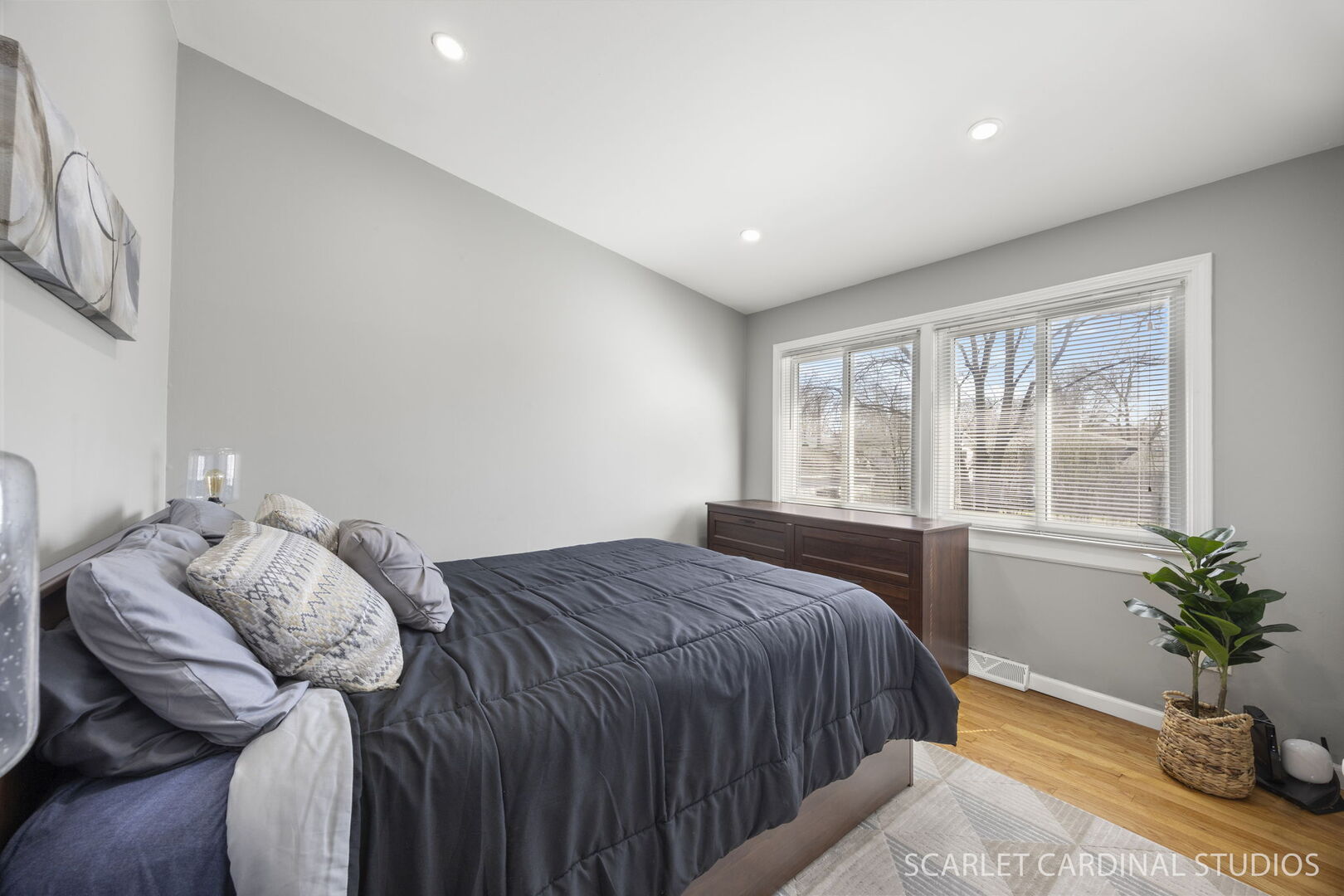 1003 East Alder Lane Mount Prospect, IL 60056 - Photo 19 of 35 a bedroom with a bed and windows