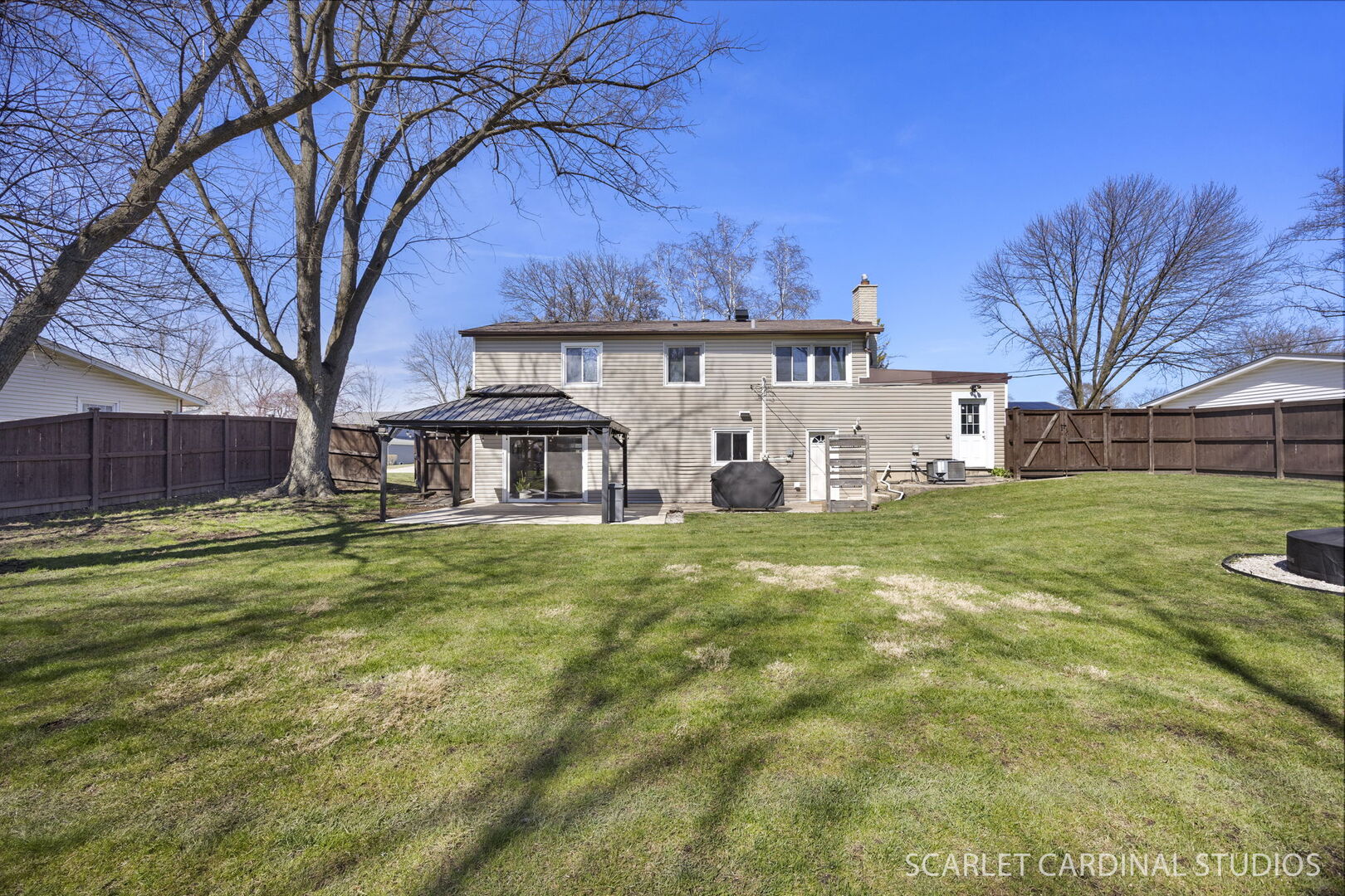 1003 East Alder Lane Mount Prospect, IL 60056 - Photo 25 of 35 a view of a house with a big yard