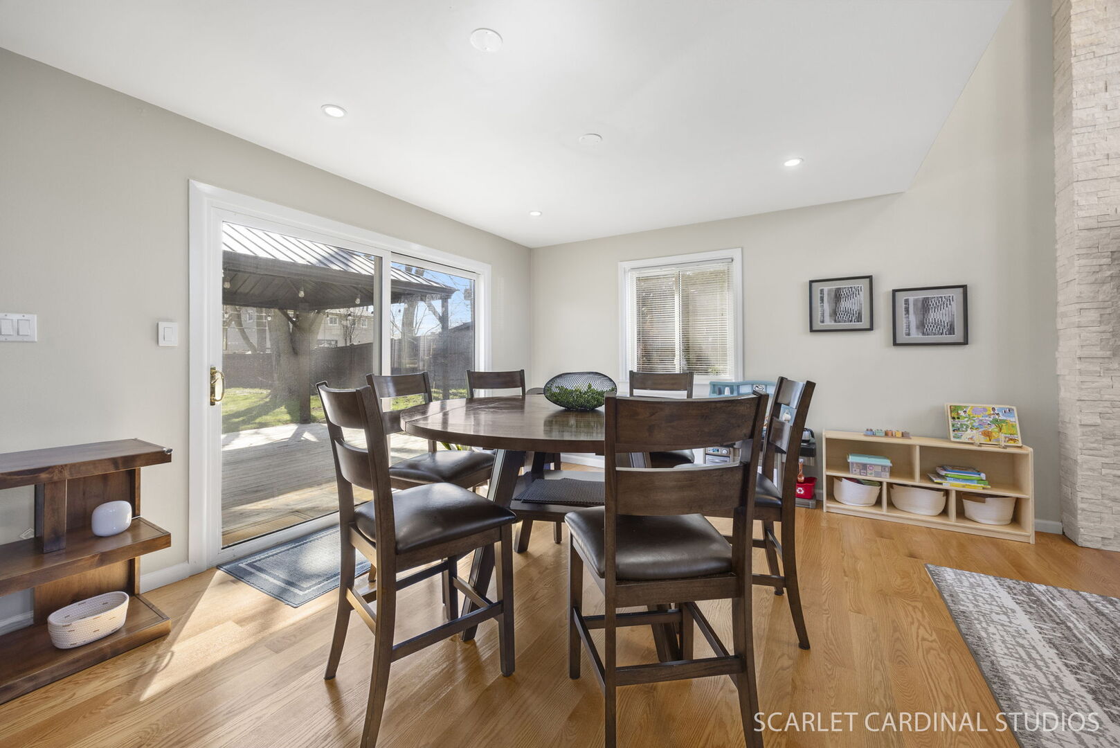 1003 East Alder Lane Mount Prospect, IL 60056 - Photo 7 of 35 a view of a dining room with furniture and wooden floor