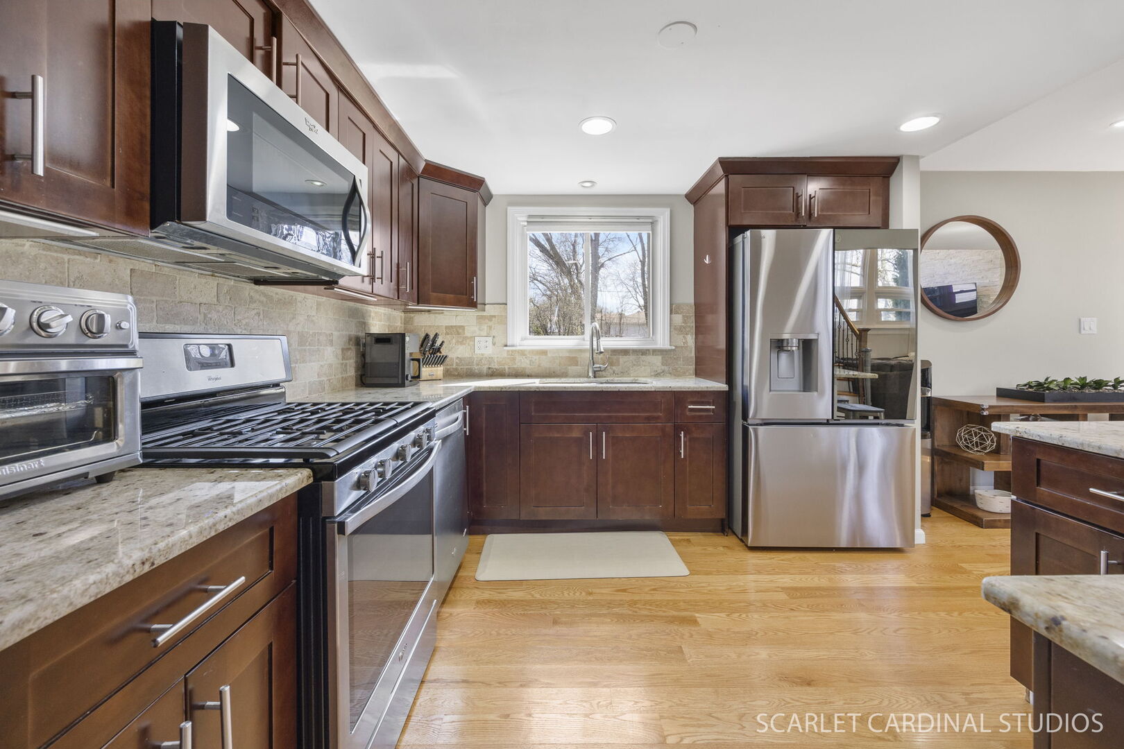 1003 East Alder Lane Mount Prospect, IL 60056 - Photo 10 of 35 a kitchen with stainless steel appliances granite countertop a stove a sink dishwasher and a refrigerator