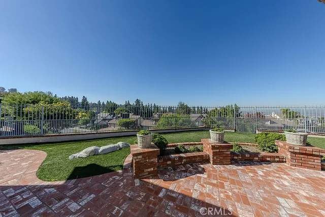 a view of a chairs and table in the terrace