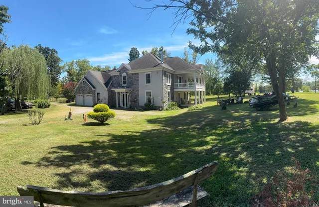 a view of a lake with a yard
