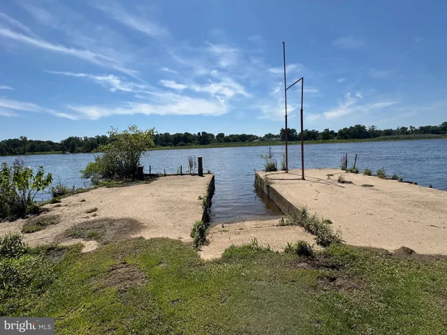 an aerial view of house with yard swimming pool and outdoor seating