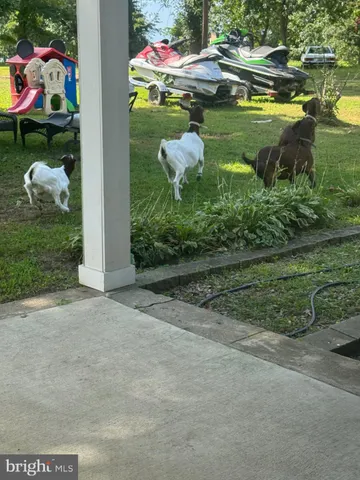 a view of a lake view with a house in the background