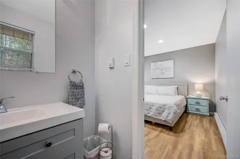 a en suite bathroom with a sink and a toilet