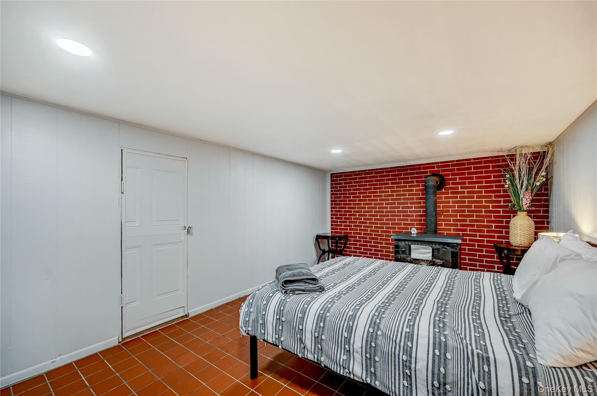 298 Learn Road Tannersville, PA 18372 - Photo 21 of 24 a bedroom with a bed and a dresser