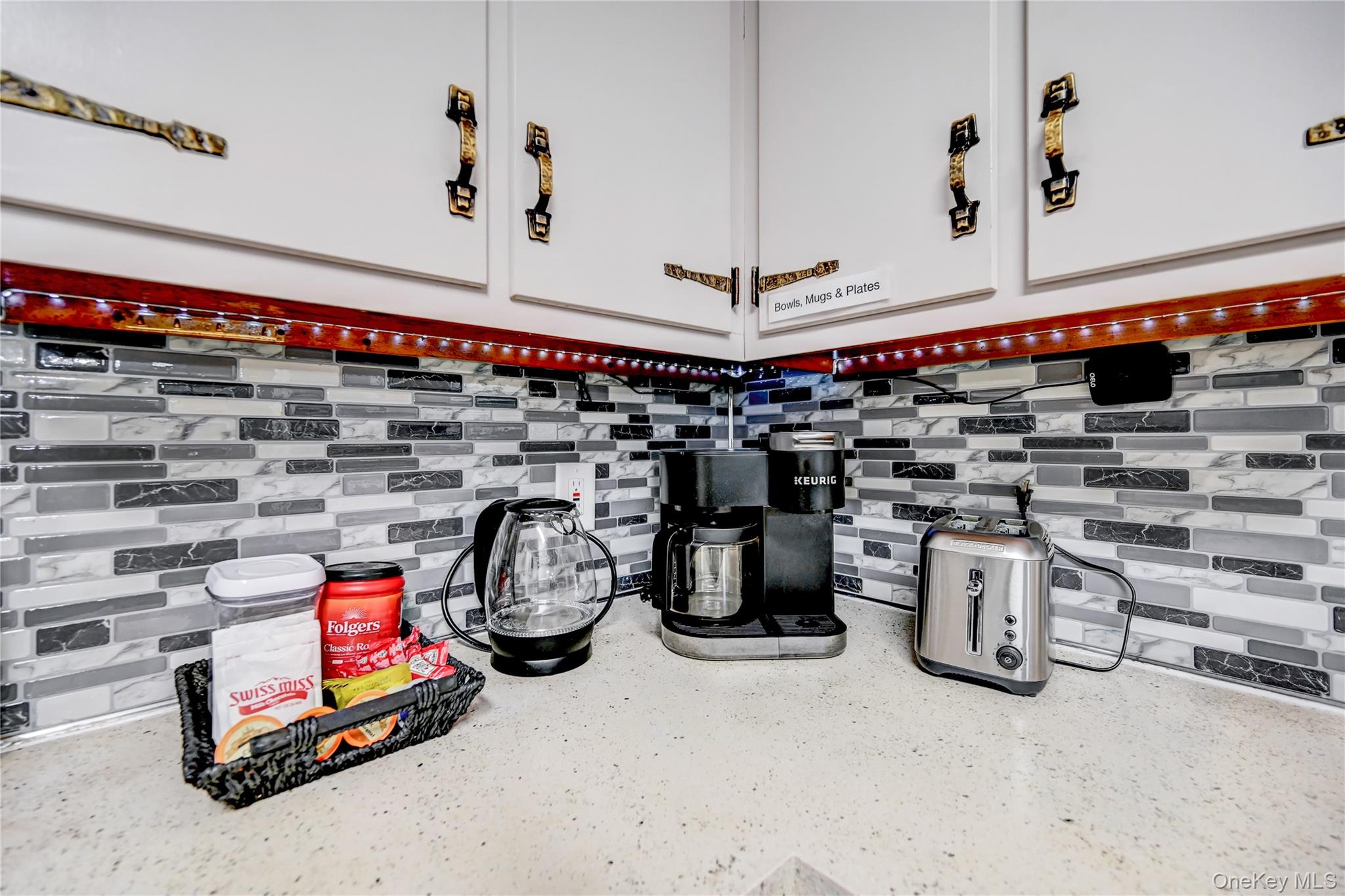 298 Learn Road Tannersville, PA 18372 - Photo 6 of 24 a storage room with water heater and racks on the wall