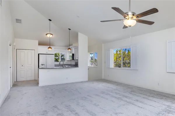 a living room with furniture and window