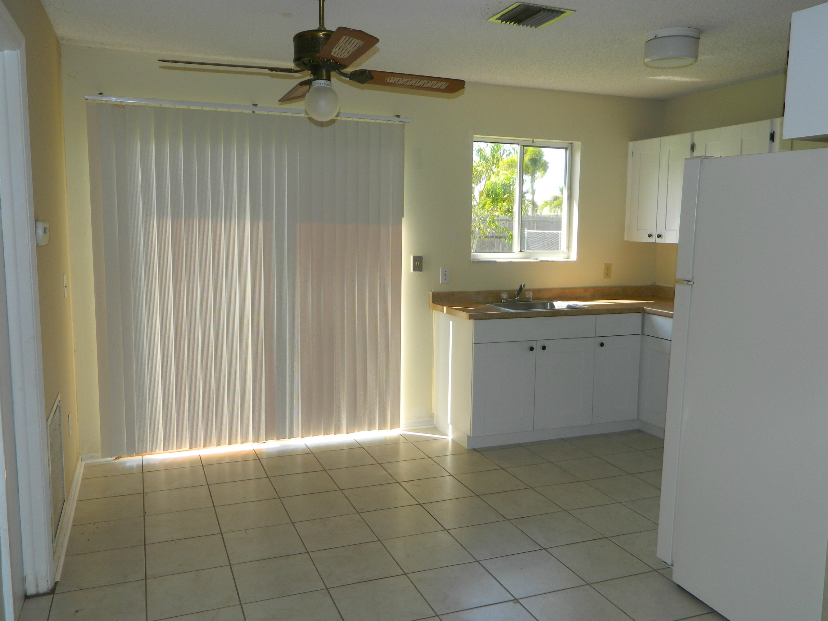 2342 Southeast Merrill Road Port St. Lucie, FL 34952 - Photo 7 of 17 Dinning/kitchen