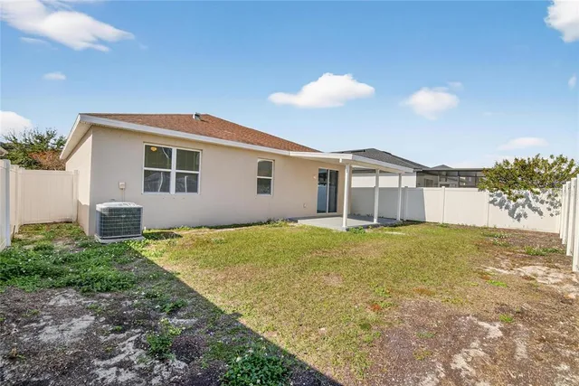 a view of a big room with an entryway