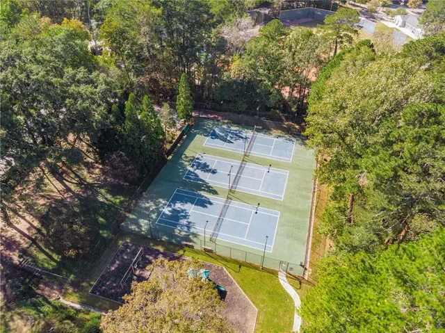 a view of swimming pool with a yard