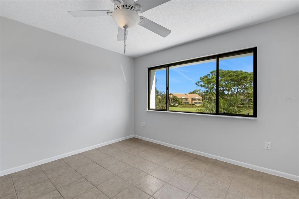 3119 Heatherwood Lane Sarasota, FL 34235 - Photo 14 of 47 en empty room with window