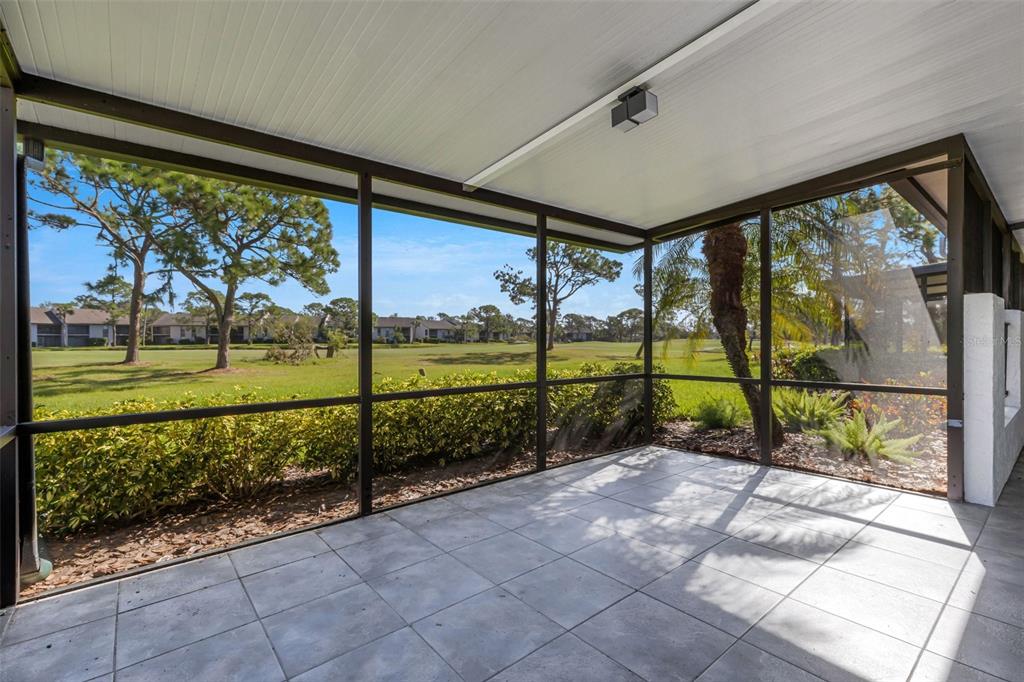 3119 Heatherwood Lane Sarasota, FL 34235 - Photo 29 of 47 a view of a porch with a yard