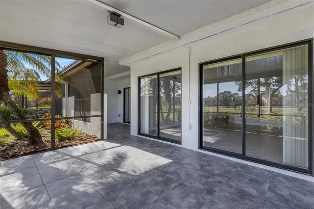 a view of a room with a large window