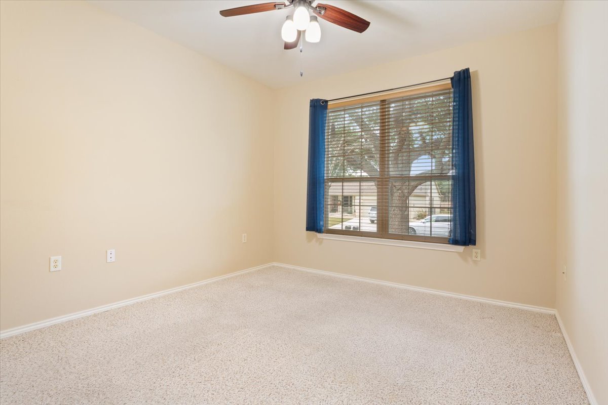 246 Red Poppy Trail Georgetown, TX 78633 - Photo 24 of 32 an empty room with a window