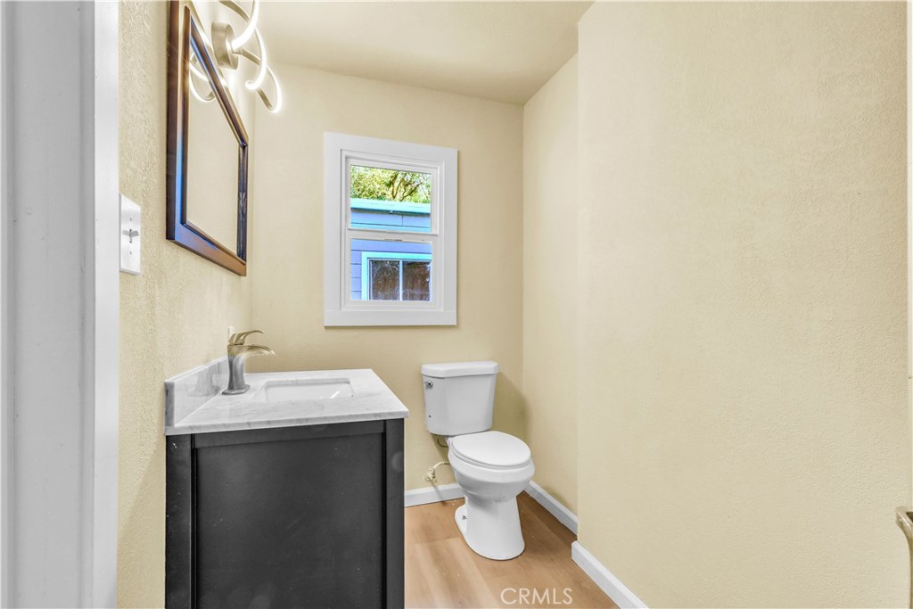 15905 Kugelman Street Lower Lake, CA 95457 - Photo 62 of 75 a bathroom with a sink and a toilet