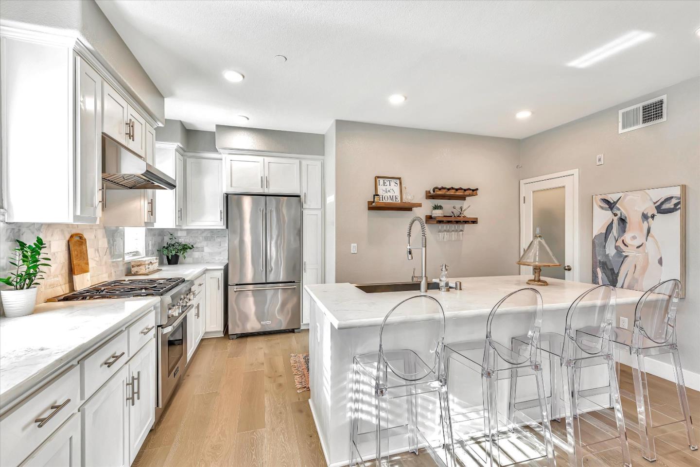 1512 Bond Street Milpitas, CA 95035 - Photo 18 of 49 a kitchen with refrigerator and cabinets
