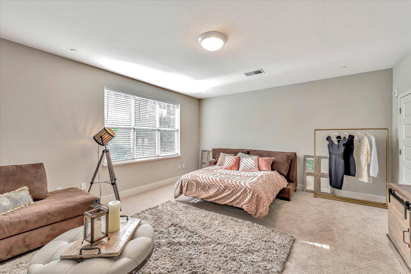 1512 Bond Street Milpitas, CA 95035 - Photo 22 of 49 a bed room with a bed and a window