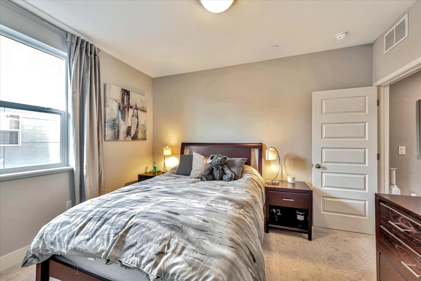 1512 Bond Street Milpitas, CA 95035 - Photo 31 of 49 a bedroom with a bed and a window