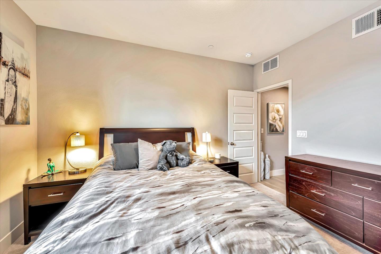 1512 Bond Street Milpitas, CA 95035 - Photo 32 of 49 a bedroom with a bed and a dresser