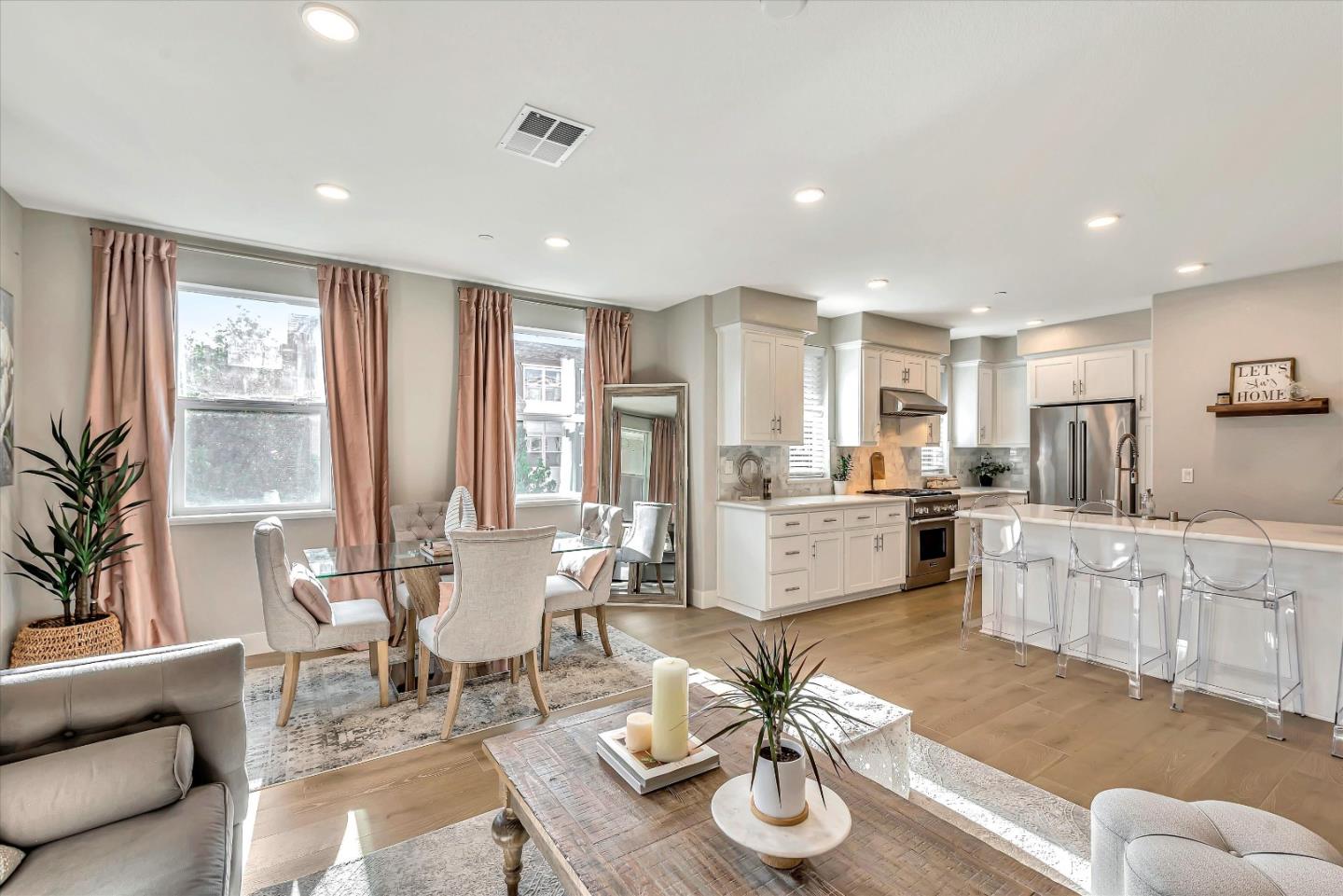1512 Bond Street Milpitas, CA 95035 - Photo 8 of 49 a kitchen with white cabinets and counter space
