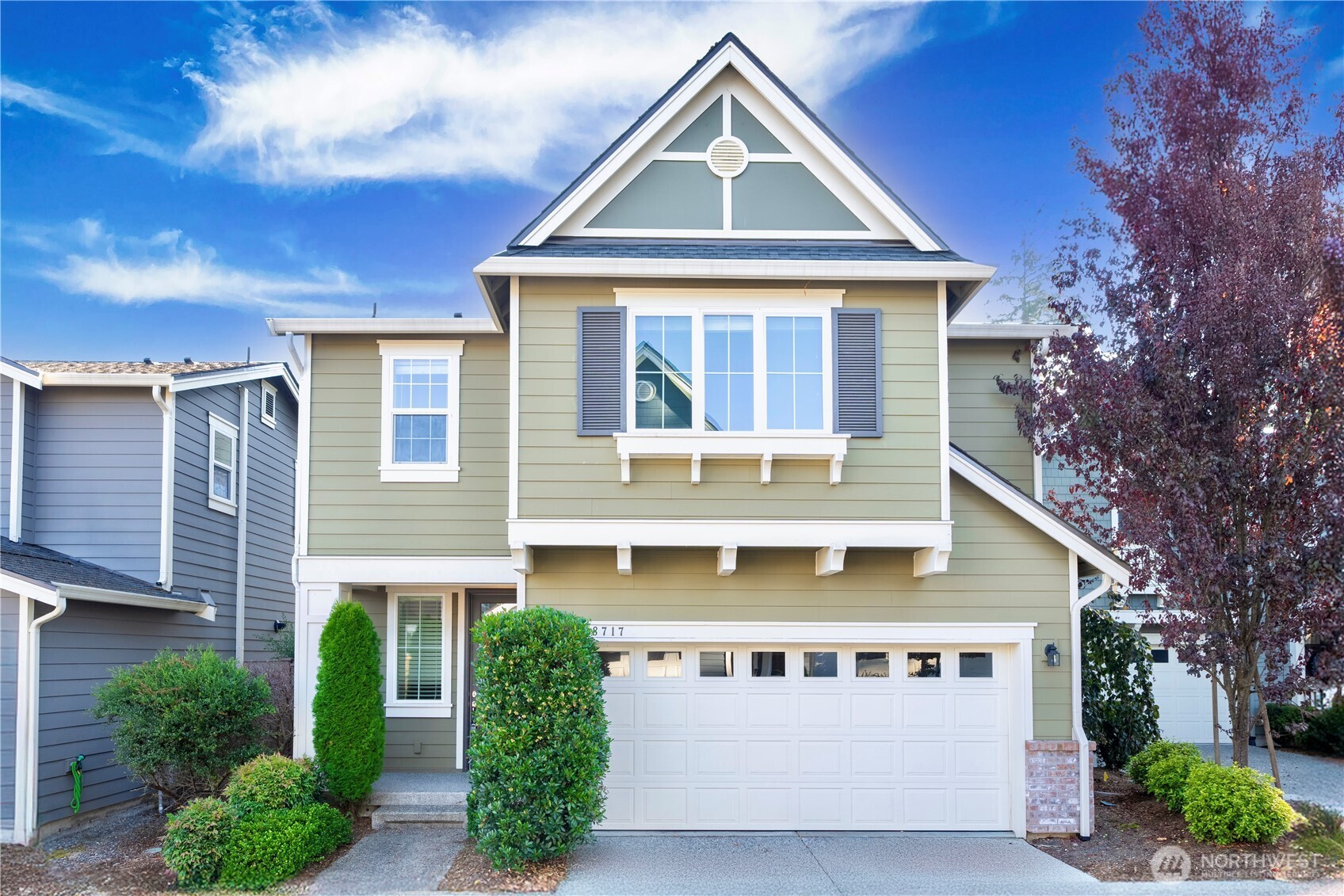 18717 43rd Drive Southeast Bothell, WA 98012 - Photo 1 of 26 a front view of a house with a yard