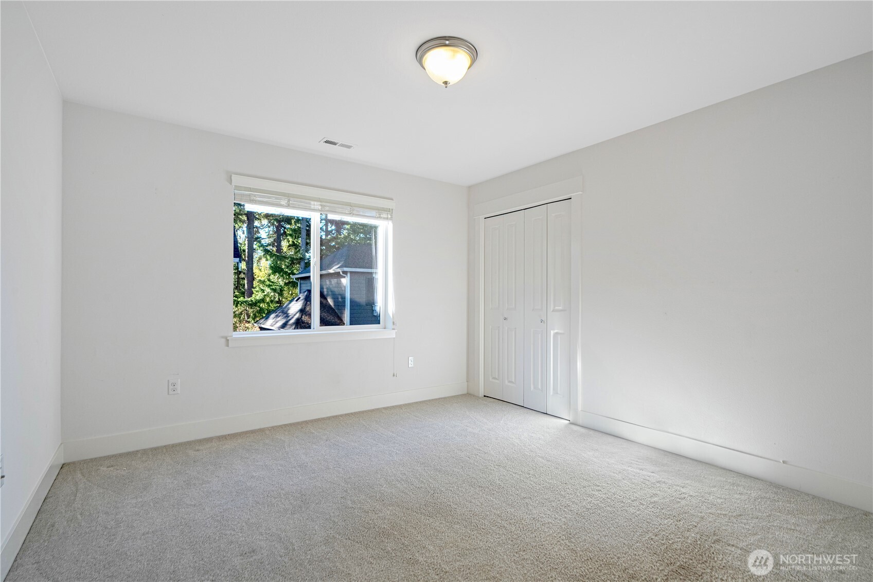 18717 43rd Drive Southeast Bothell, WA 98012 - Photo 17 of 26 an empty room with windows