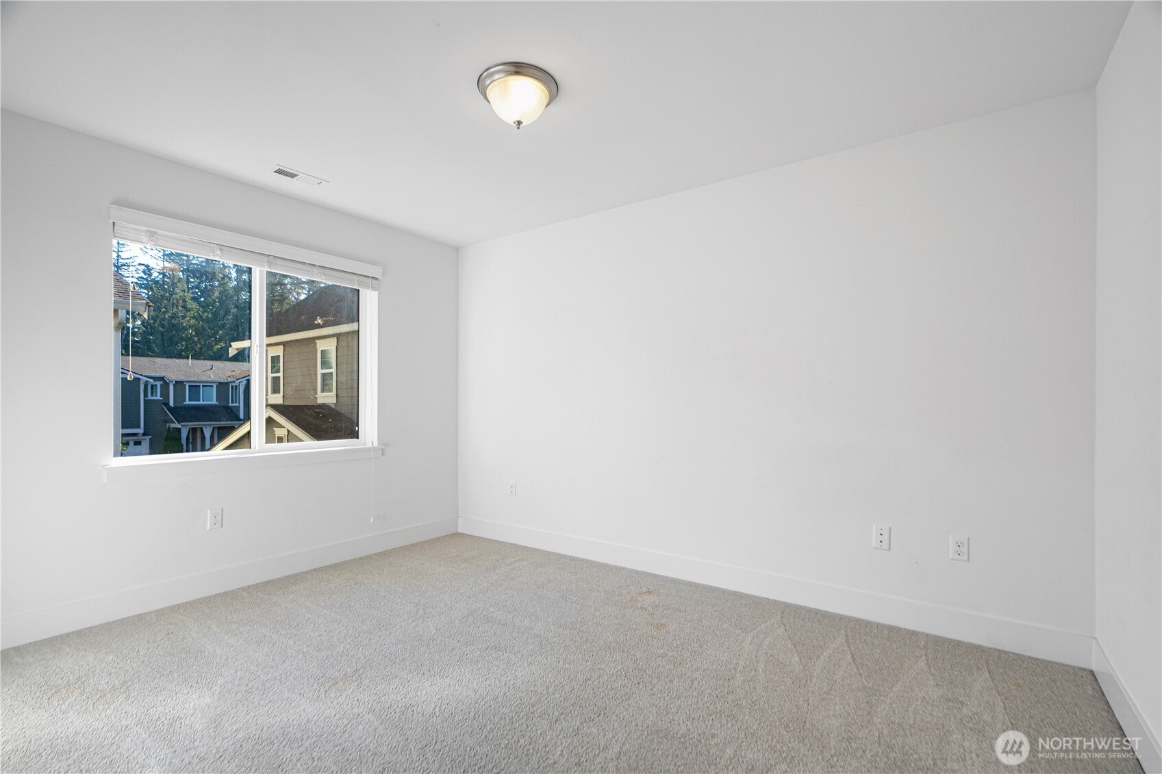 18717 43rd Drive Southeast Bothell, WA 98012 - Photo 18 of 26 an empty room with a window