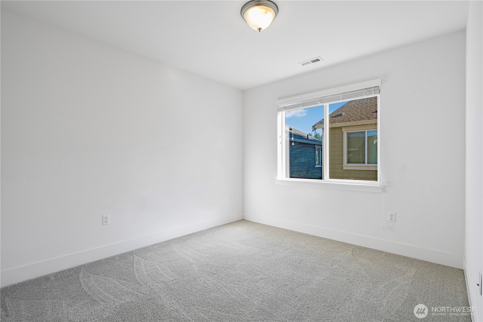 18717 43rd Drive Southeast Bothell, WA 98012 - Photo 19 of 26 a view of an empty room with a window