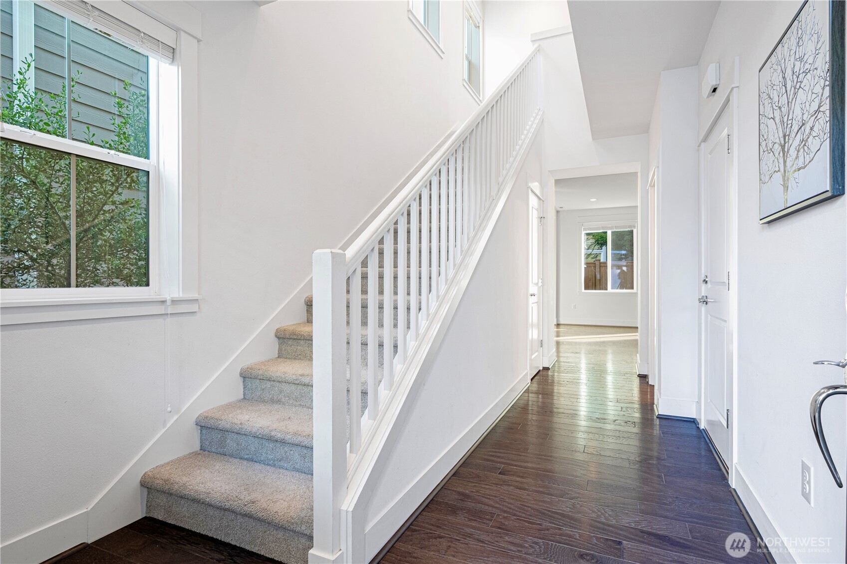 18717 43rd Drive Southeast Bothell, WA 98012 - Photo 2 of 26 a view of staircase with wooden floor and white walls