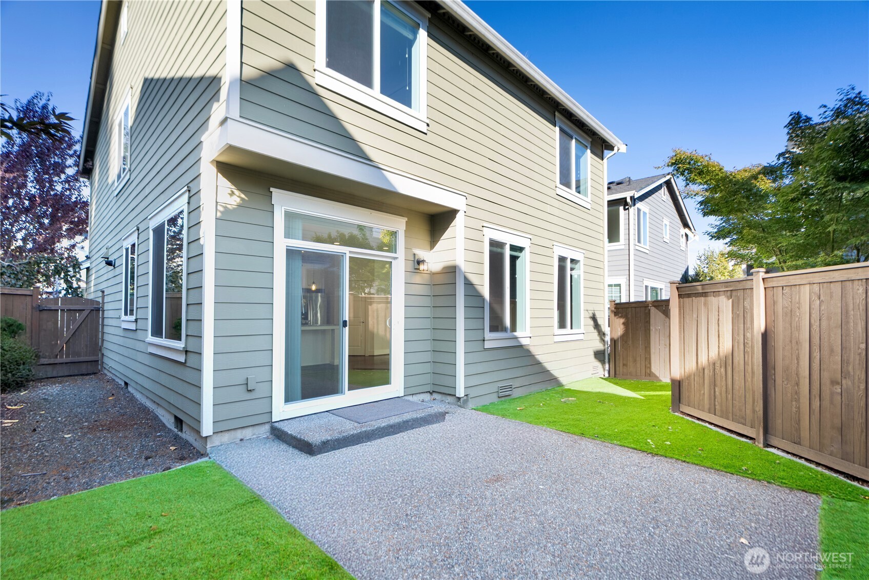 18717 43rd Drive Southeast Bothell, WA 98012 - Photo 22 of 26 a front view of a house with a yard and porch