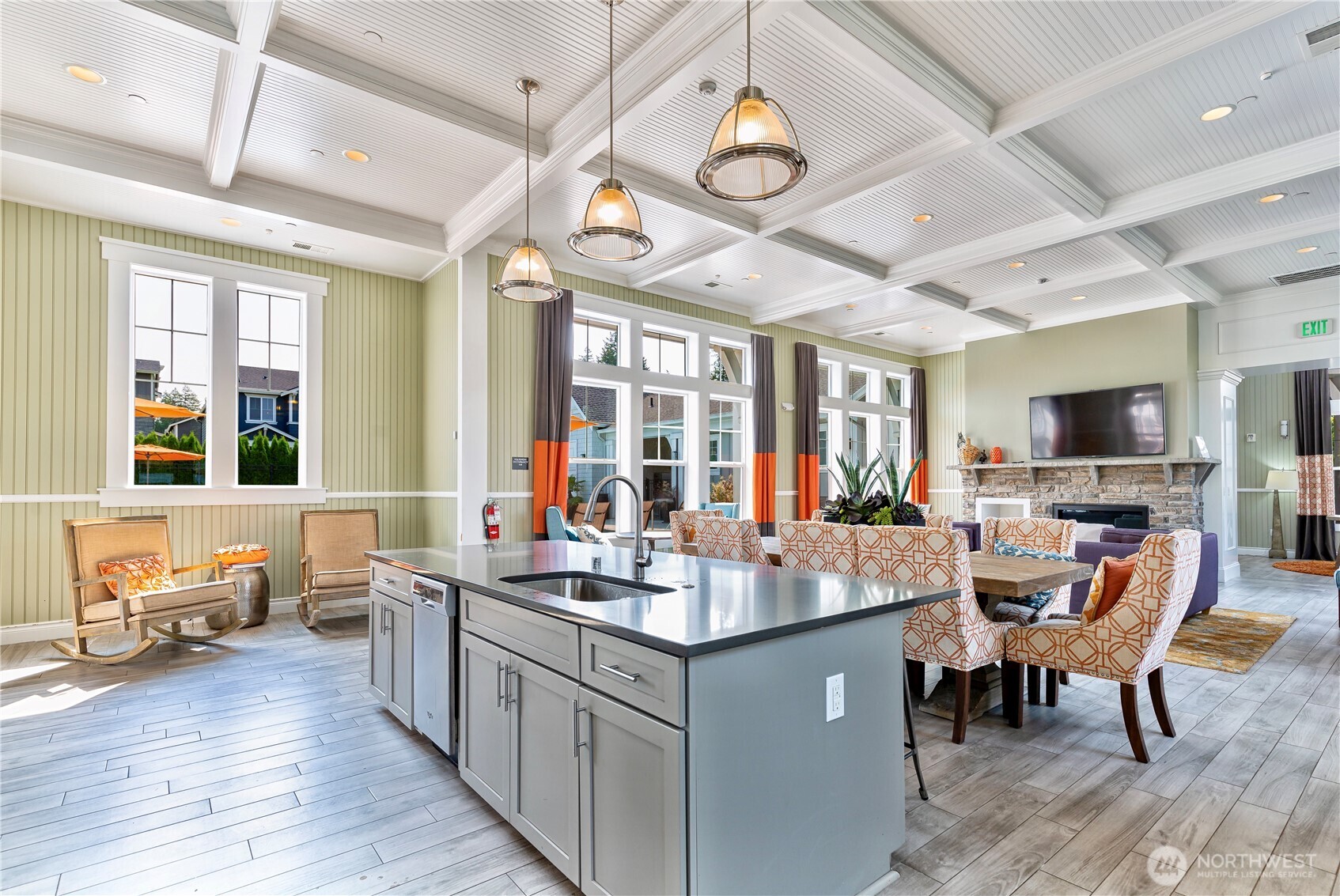 18717 43rd Drive Southeast Bothell, WA 98012 - Photo 25 of 26 a large living room with stainless steel appliances granite countertop furniture and a flat screen tv
