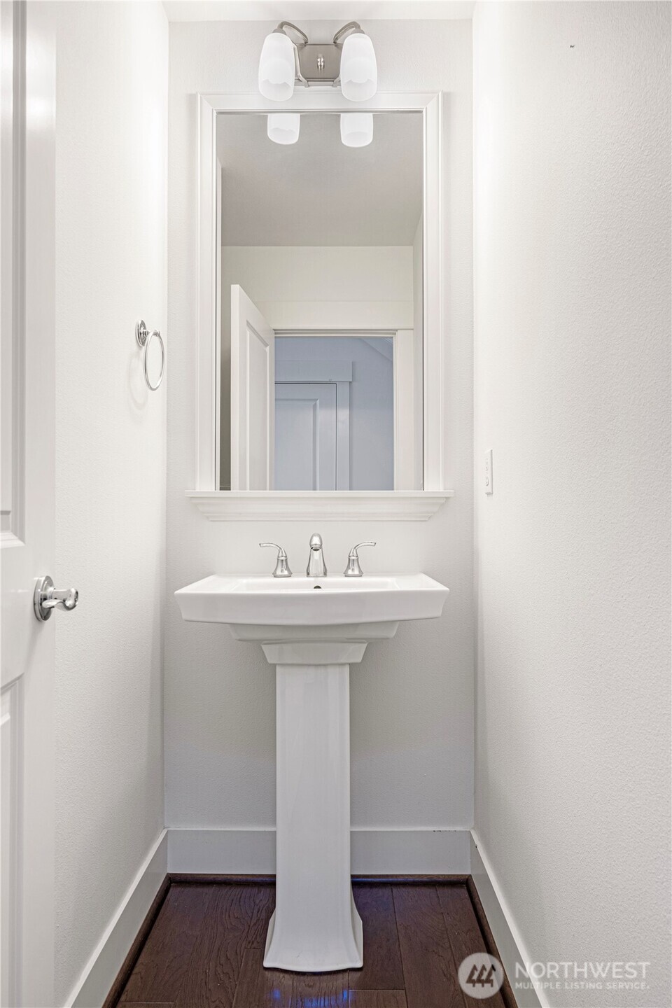 18717 43rd Drive Southeast Bothell, WA 98012 - Photo 4 of 26 a bathroom with a sink and a mirror