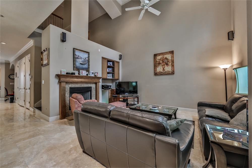 1005 Memorial Village Drive Houston, TX 77024 - Photo 6 of 32 a living room with furniture and a fireplace
