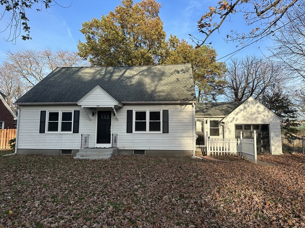 144 Stony Hill Road Wilbraham, MA 01095 - Photo 2 of 15 front view of a house with a yard