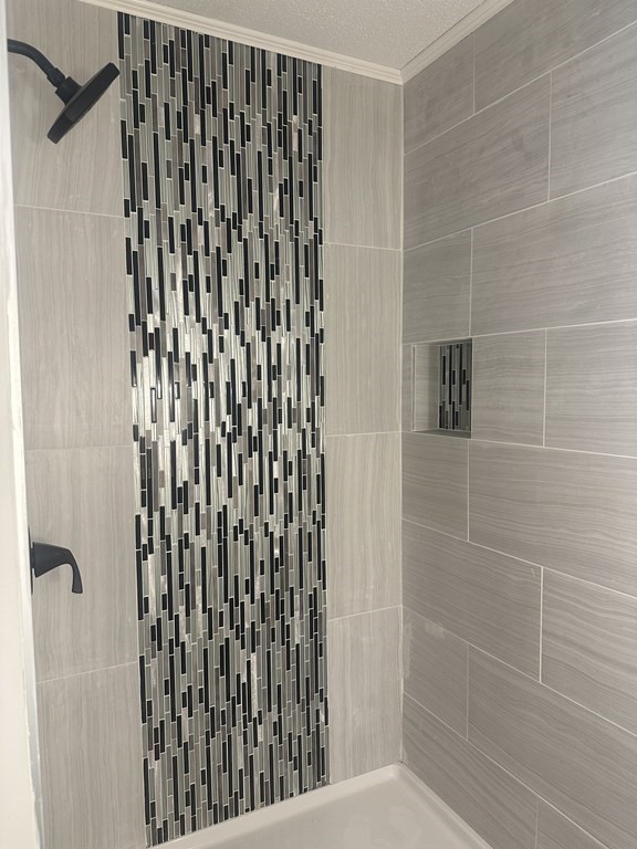 144 Stony Hill Road Wilbraham, MA 01095 - Photo 10 of 15 a bathroom with a shower and a shower curtain