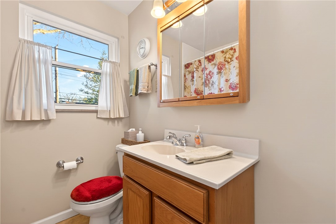 1237 Laurelwood Road Dayton, OH 45409 - Photo 21 of 56 This bathroom features a sleek vanity and ample natural light, creating a bright and inviting space.