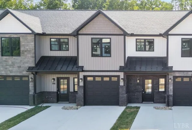 a front view of a house with yard