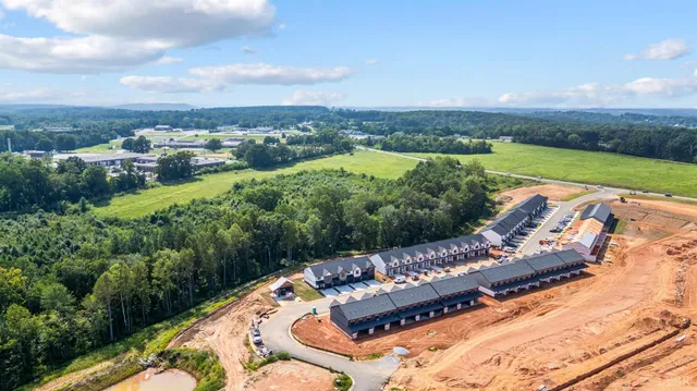 a view of a house with large windows