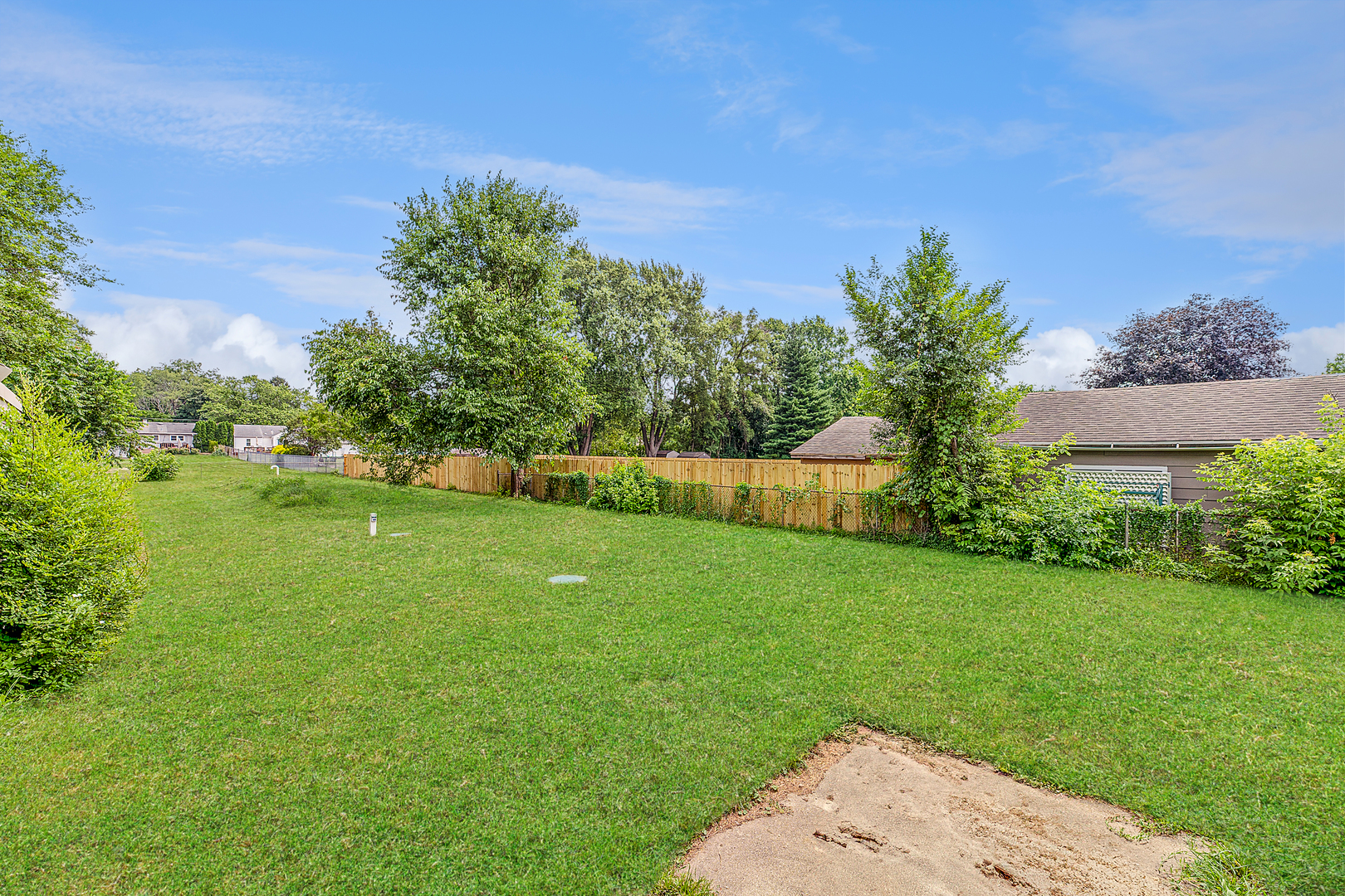 1S217 Valley Road Lombard, IL 60148 - Photo 19 of 23 a view of a garden with a building in the background