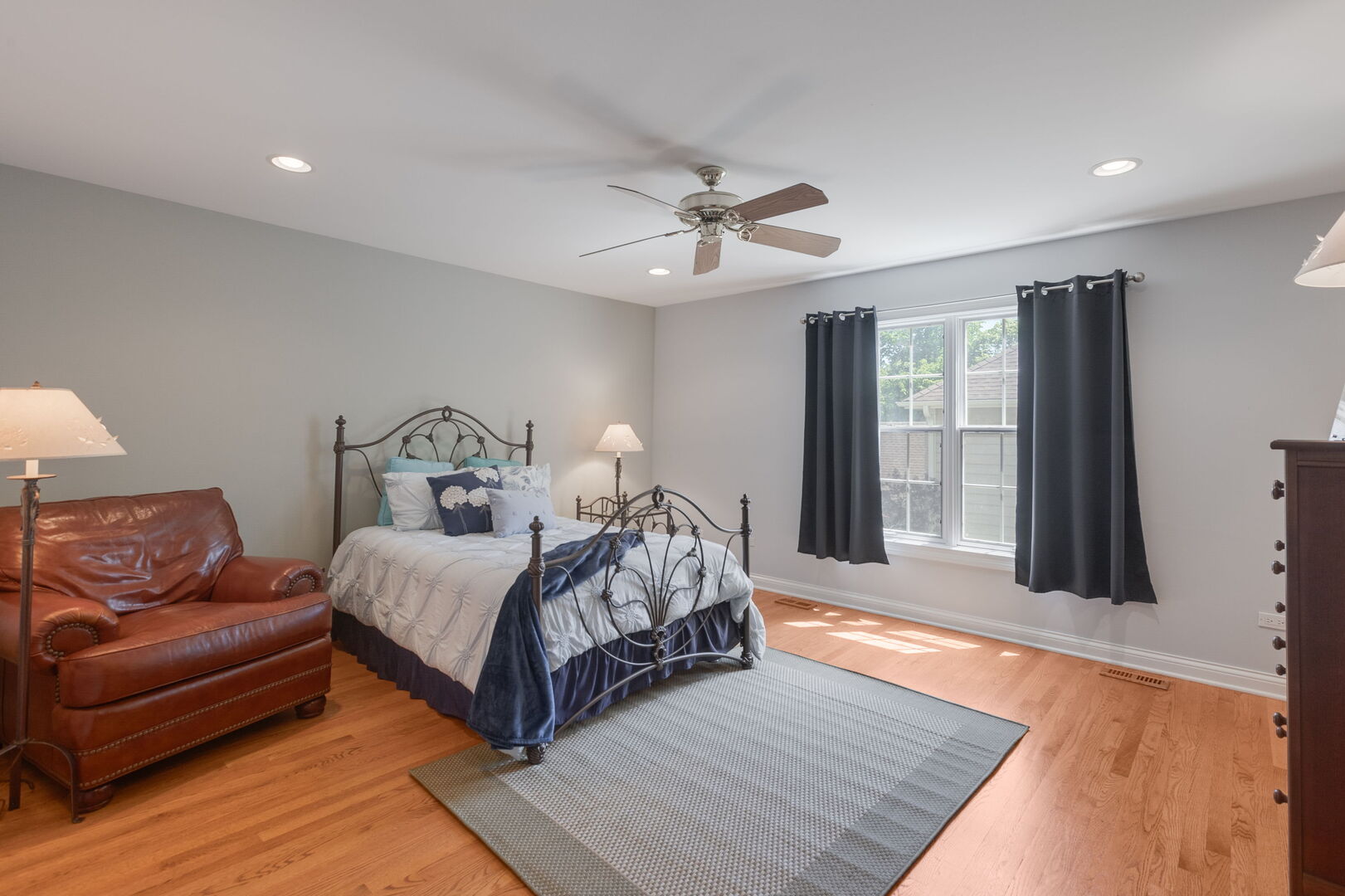 209 Carriage Trail Barrington, IL 60010 - Photo 22 of 42 a bedroom with a bed couch and window