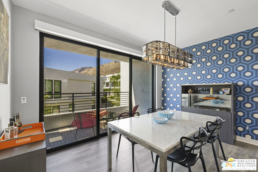 467 Huddle Spgs Way Palm Springs, CA 92264 - Photo 19 of 48 a view of a dining room with furniture window and outside view