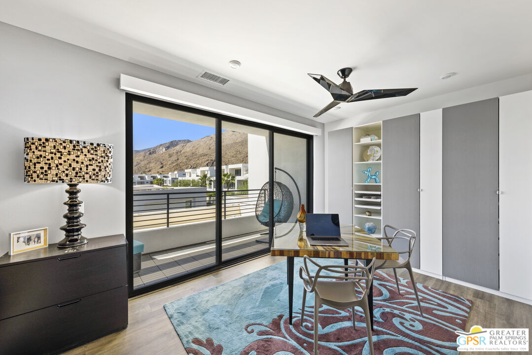 467 Huddle Spgs Way Palm Springs, CA 92264 - Photo 28 of 48 a work room with furniture and wooden floor