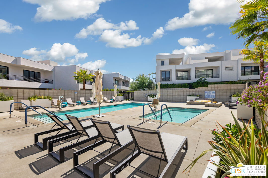 467 Huddle Spgs Way Palm Springs, CA 92264 - Photo 40 of 48 a view of a patio with swimming pool table and chairs