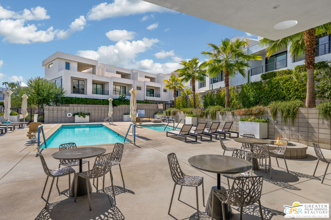 467 Huddle Spgs Way Palm Springs, CA 92264 - Photo 41 of 48 a view of a chairs and table in the patio