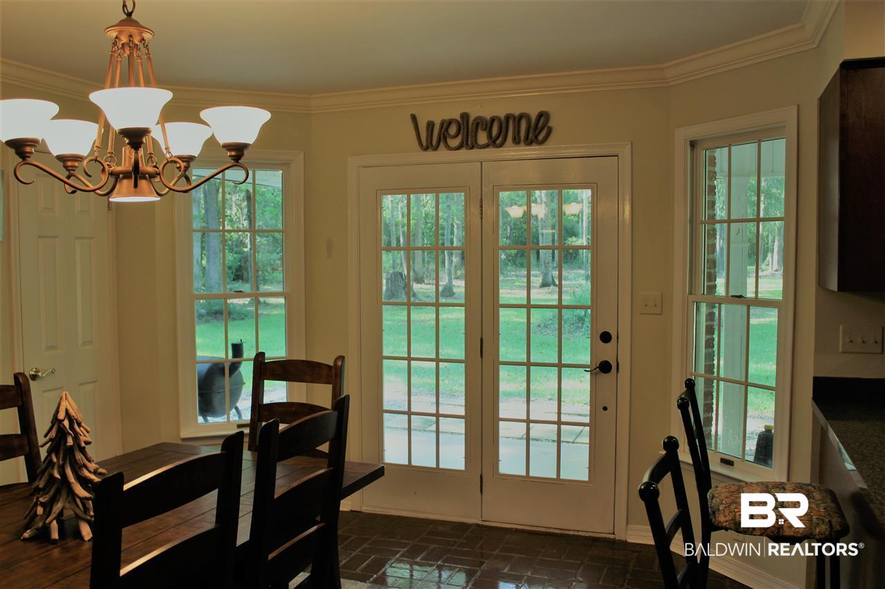 25299 Coopers Cemetery Road Robertsdale, AL 36567 - Photo 12 of 24 Dining Room looks out over back acreage